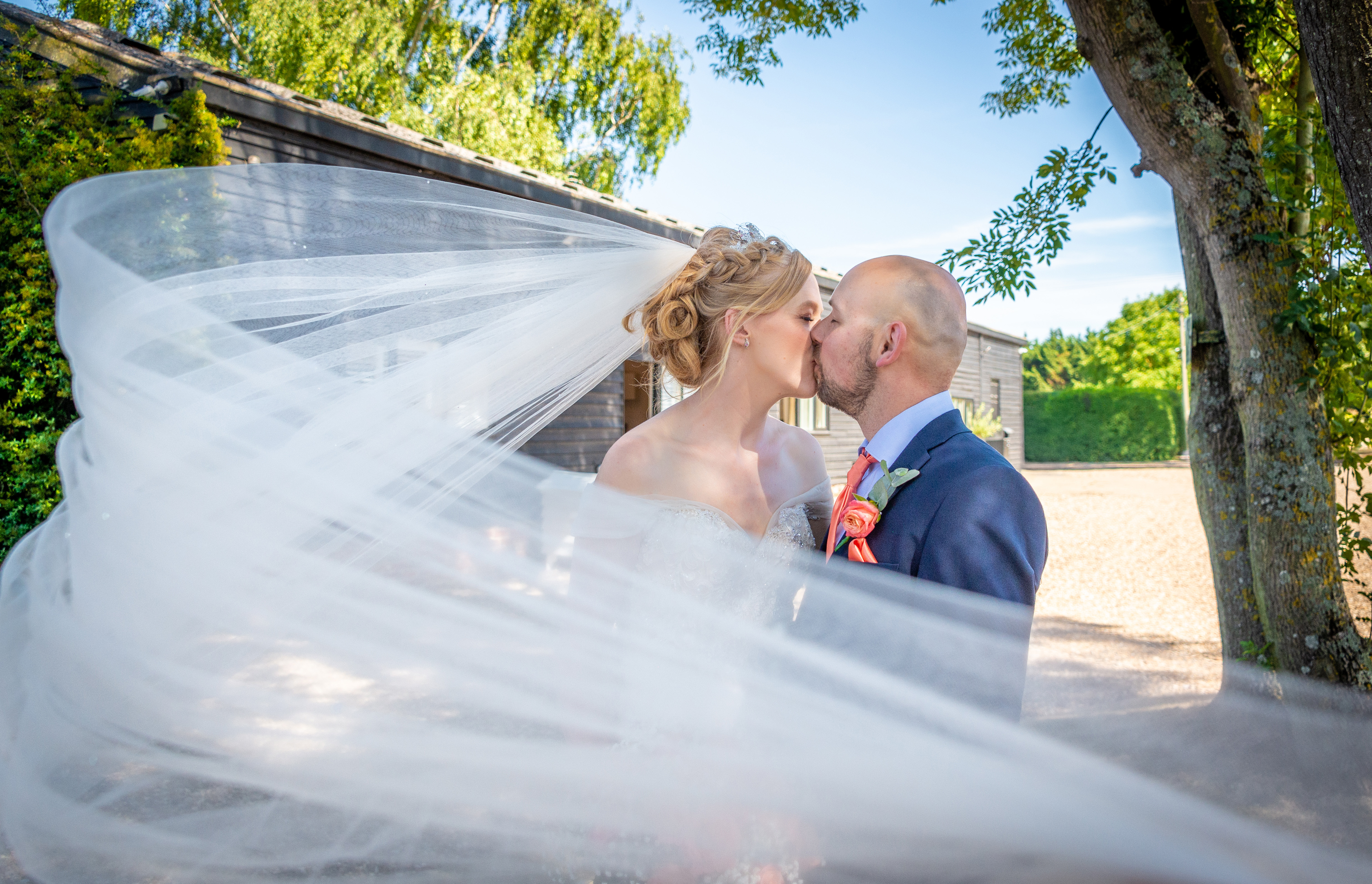 Sweeping veil photo at Winters Barn Wedding Venue in Ashford