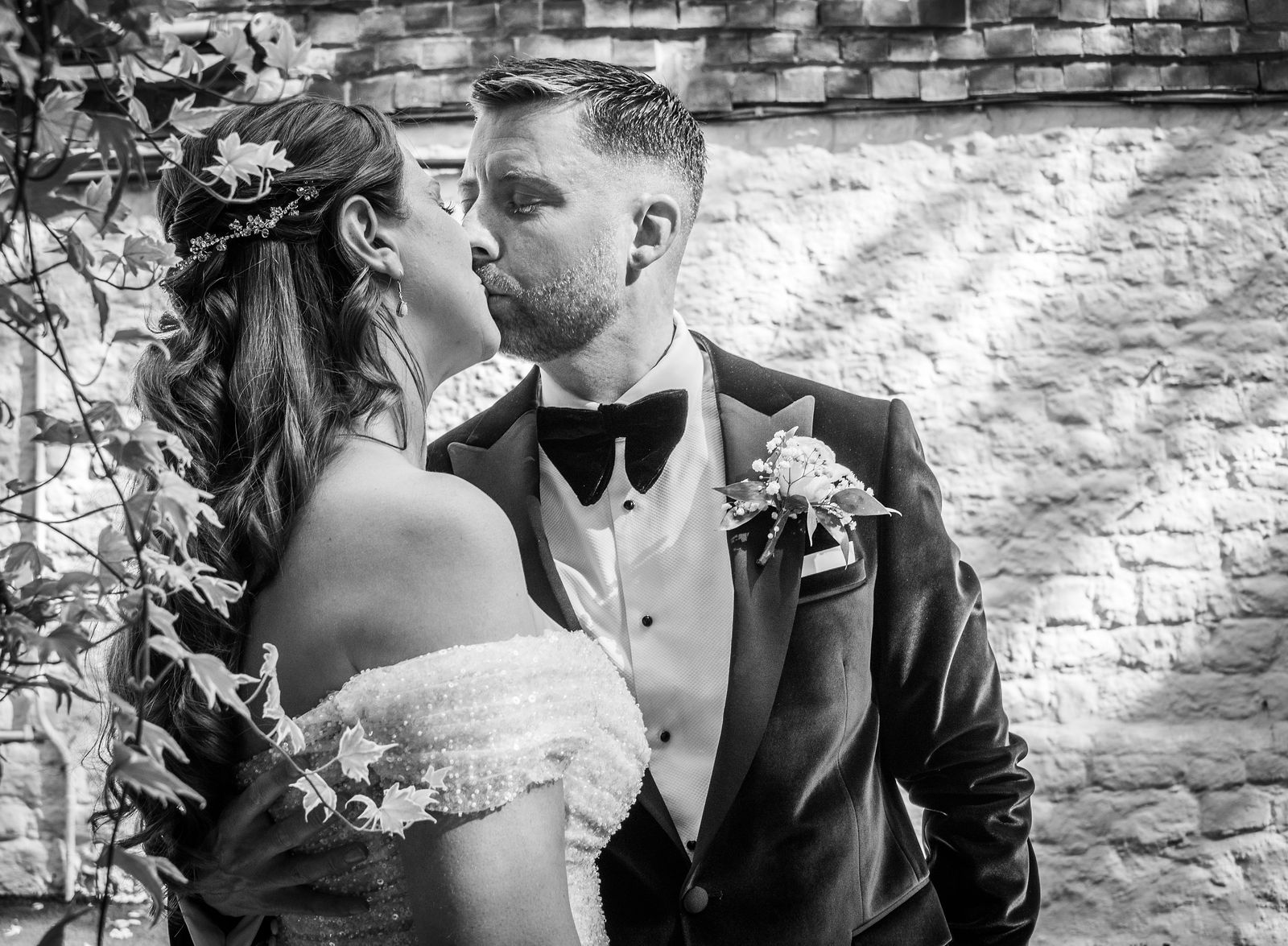 Couple's kiss at The Buttery and Glasshouse wedding venue in Wrotham, Maidstone