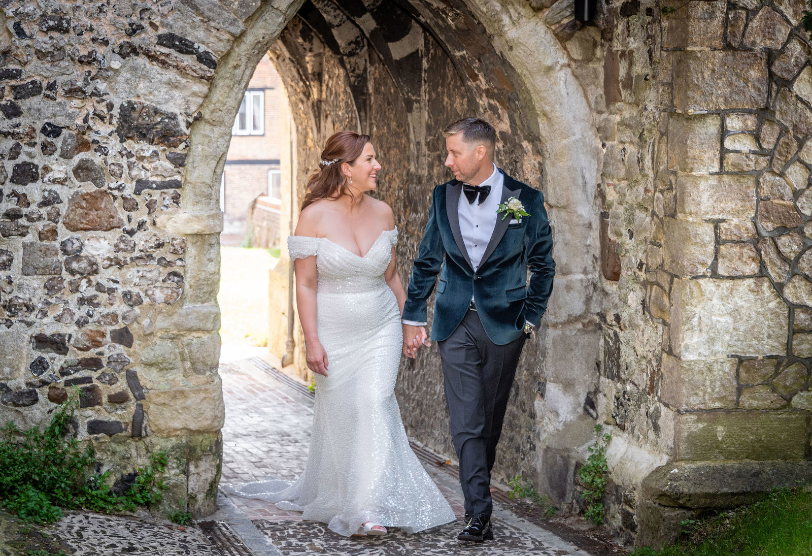 A relaxed couples photos at the Buttery and Glasshouse wedding venue in Kent