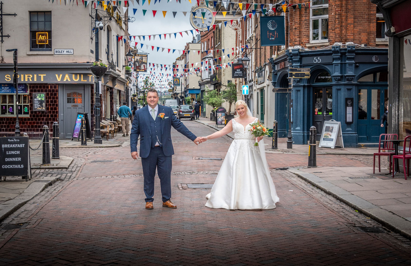 Rochester High Street couples portrait at The Vines of Rochester wedding venue in Kent